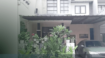 tampak depan rumah 2 lantai dalam cluster