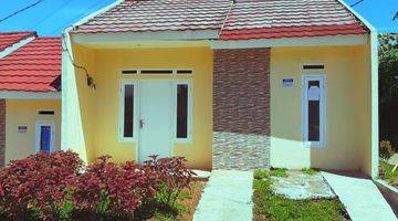 tampak depan rumah subsidi berkonsep cluster tanpa