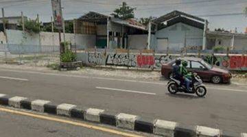 tampak depan tanah dijual tepi jalan raya