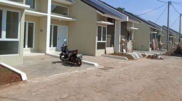 tampak depan rumah cluster bata merah murah