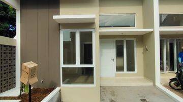 tampak depan rumah cluster bata merah murah