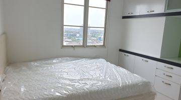 kamar tidur apartmen evian garden akses ke