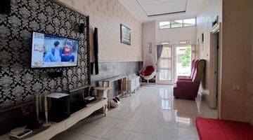 ruang keluarga rumah siap huni terawat bagus