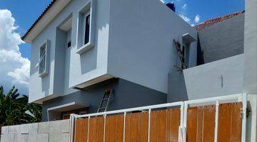 tampak depan rumah hoek 2 lantai di