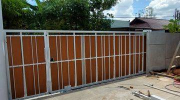 garasi/carport rumah hoek 2 lantai di