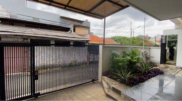 garasi/carport  rumah semi furnished sudah renovasi