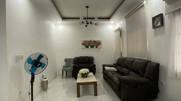 ruang tamu rumah di green lake city