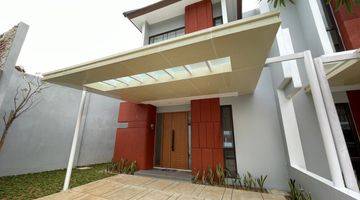 tampak depan rumah minimalis dengan halaman belakang