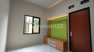 ruang keluarga rumah baru siap huni dan