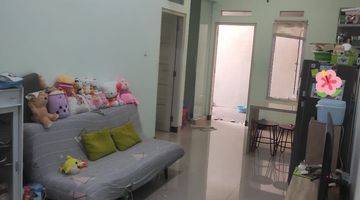 ruang keluarga rumah cantik di perumahan cluster