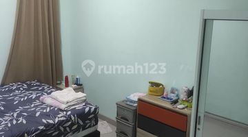 kamar tidur rumah cantik di perumahan cluster