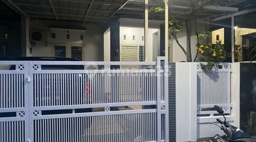tampak depan rumah baru sekesai renovasi perumahan