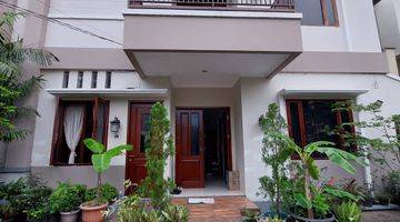 tampak depan rumah siap huni depan taman
