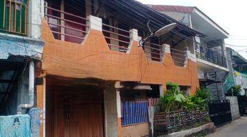 tampak depan rumah tengah kota cocok untuk