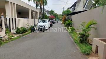 tampak depan rumah di villa cipinang indah