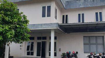 tampak depan gudang plus kantor zona pabrik