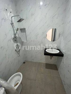 Rumah 6x15 Metland