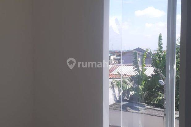 RUMAH BARU 3 KAMAR DALAM CLUSTER BEBAS BANJIR DI JATIMAKMUR 