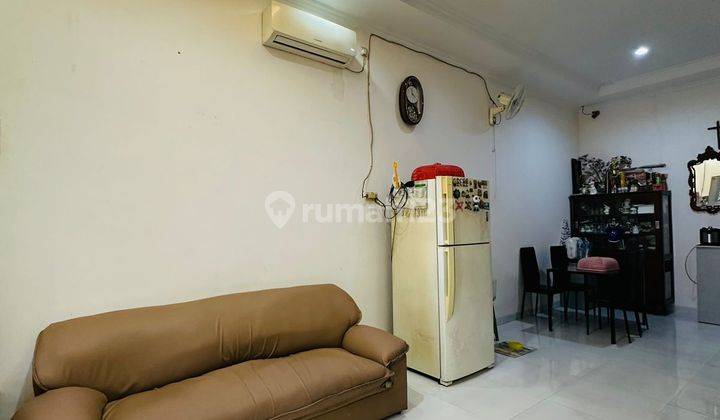 Rumah Metland Puri 6x13,5 SHM 3 Lantai Hadap Tenggara 1