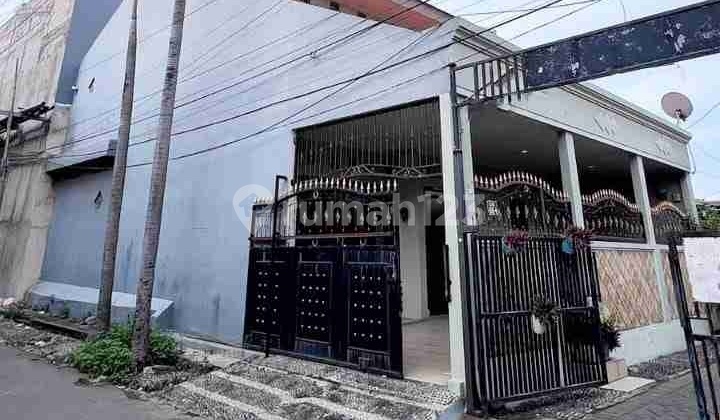 2-Story Hook House in Manukan, West Surabaya Near Citraland & Pakuwon | 4 Bedrooms, SHM Certificate