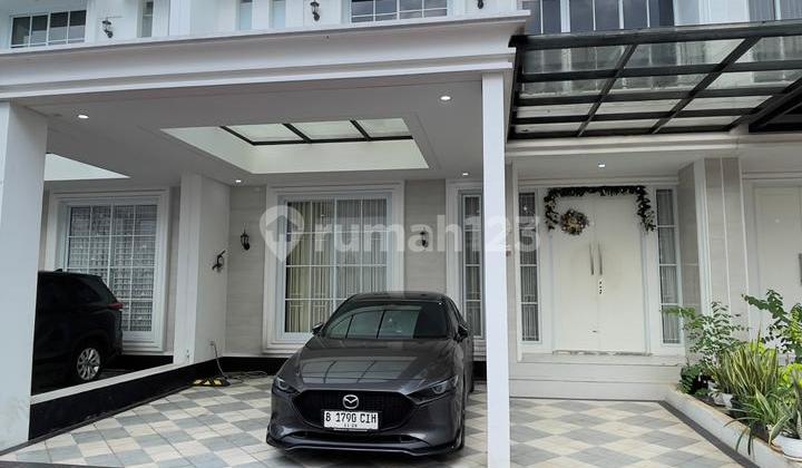 Rumah Modern 'American Klasik Siap Huni Hanya 5 Menit ke Pintu Toll Semi Furnished Dalam Cluster Ada Fasilitas Cluster , Nyaman Aman dan Lingkungan Bebas Banjir Lokasi Strategis di Bambu Apus Cipayung Jakarta Timur 2