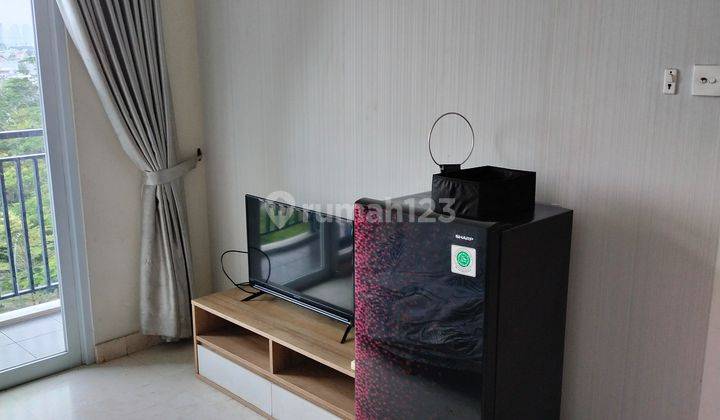 ruang keluarga apart puri orchard 2br furnish