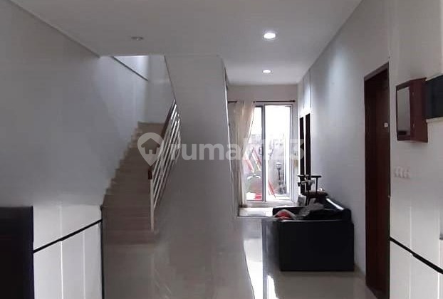 Rumah hoek 15x20 303m Type 6KT Cluster Dbanyan JGC Jakarta Garden City 2