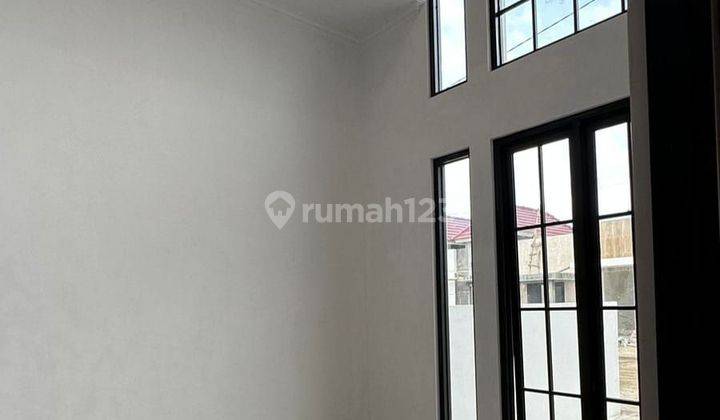 Rumah murah modern glass house lokasi strategis nol jalan raya lingkar barat kepanjen malang 2