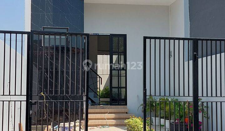 Rumah di Kedinding 2 Lantai Baru depan SMP Taruna 1