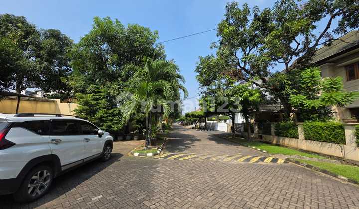 Serene Home in a Garden Complex with Spacious Parking in Kemang Pratama, Bekasi 2