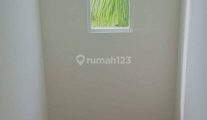 Rumah modern minimalis hook di Emerald Bintaro (7334h) 2