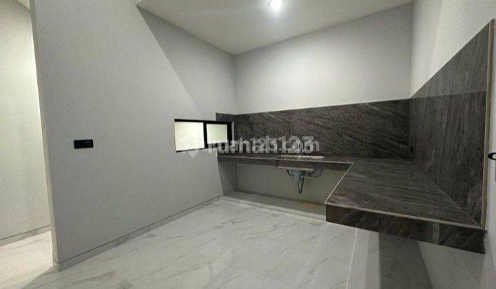 RUMAH MINIMALIS SPLIT LEVEL CITRALAND 2