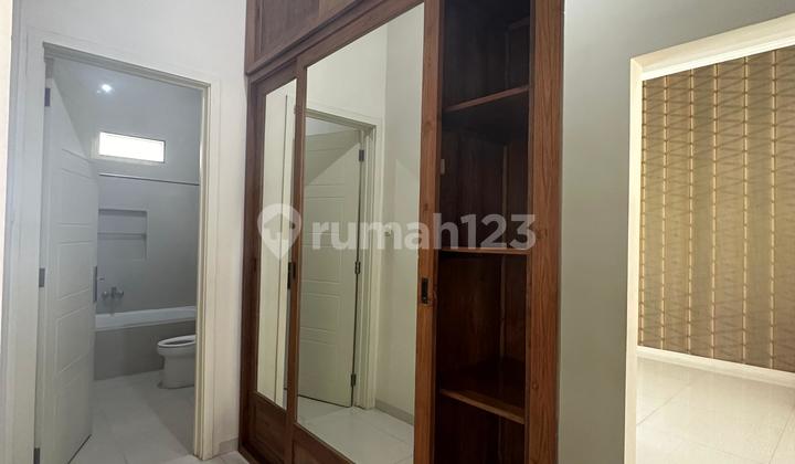 Semi-Furnished Minimalist Ell House Area Pakuwon City Mulyorejo Galaxy