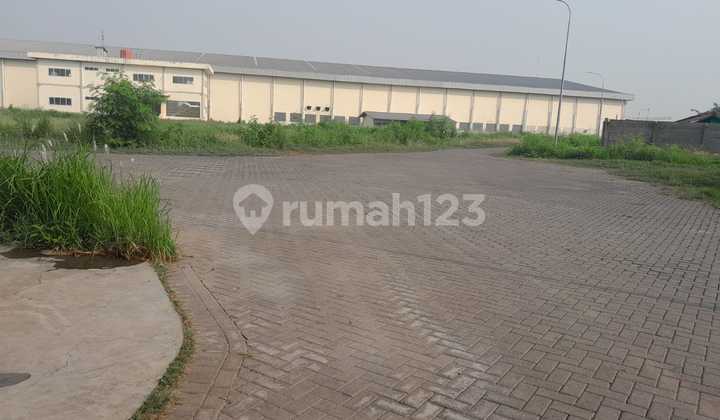 Strategic Logistics Warehouse on the side of the Pantura Cikarang highway.