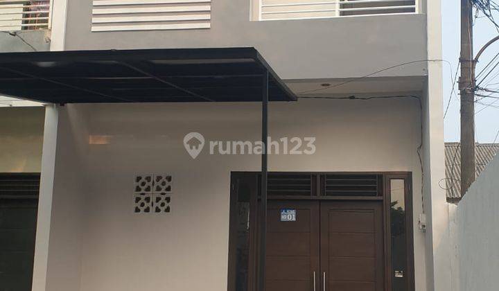 Murah BU Rumah 2 Lantai Baru Renovasi. Siap Tinggal Deket Green Lake City Jakarta Barat 1