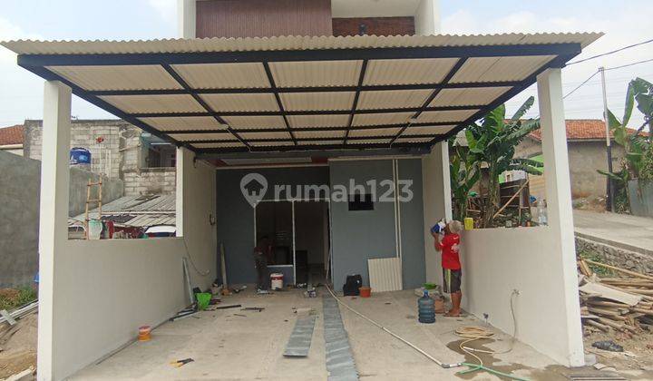 Rumah modern 3 menit ke pintu tol krukut desari 1