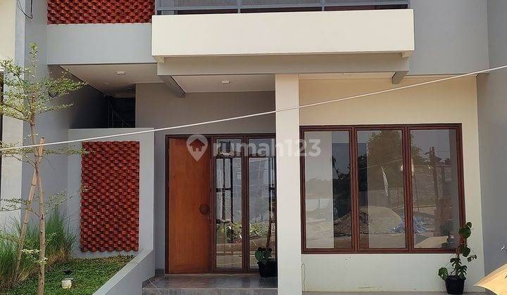 Rumah 2 Lantai Desain Modern Tropis Di Sawangan Depok 1