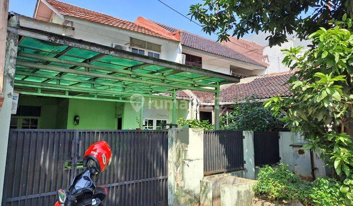 rumah epik harga irit  pinggir jln di pondok kopi, duren sawit

 1