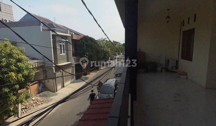 rumah elit harga ambrol depan taman di pondok kelapa, duren sawit
 2