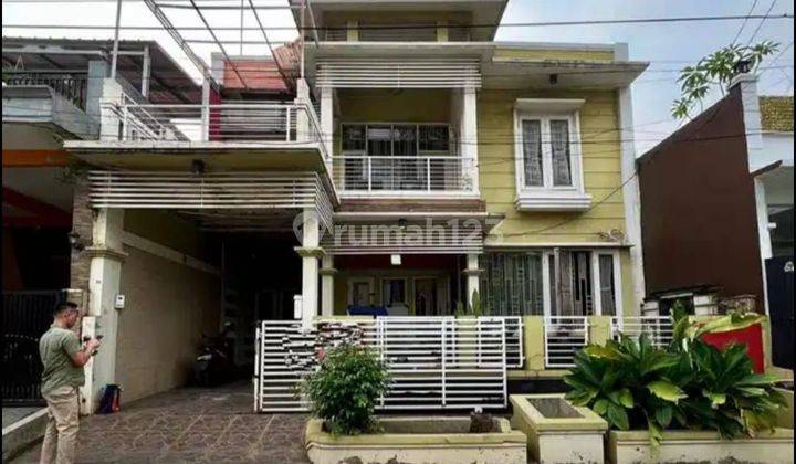 rumah kuning keren cantik murah di galaxy bekasi selatan 1