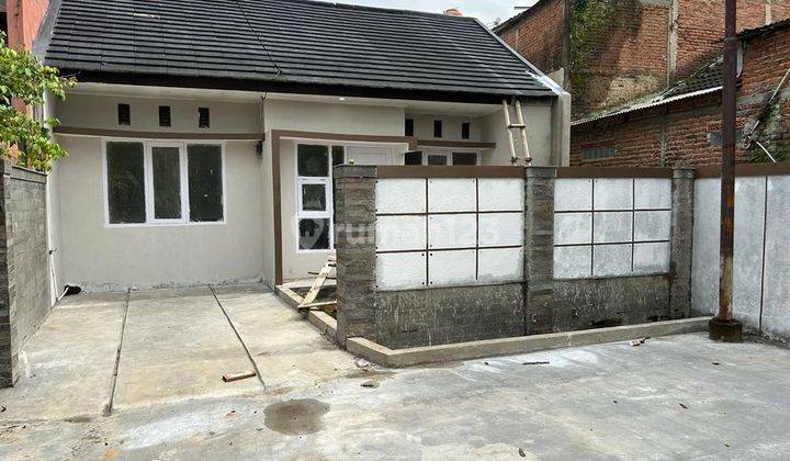 RUMAH TAMAN RAHAYU SAYAP TKI BANGUNAN MINIMALIS BARU 1