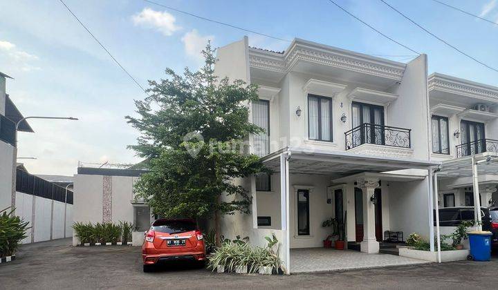 Rumah Bagus 2.5 Lantai Pinggir Jalan Raya 1