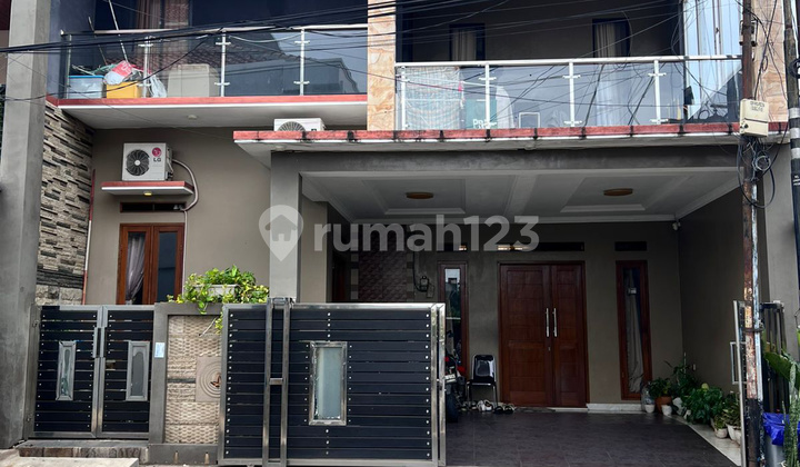 Rumah 2 Lantai Siap Huni dengan Hunian Nyaman dan Asri di Pinang, Tangerang