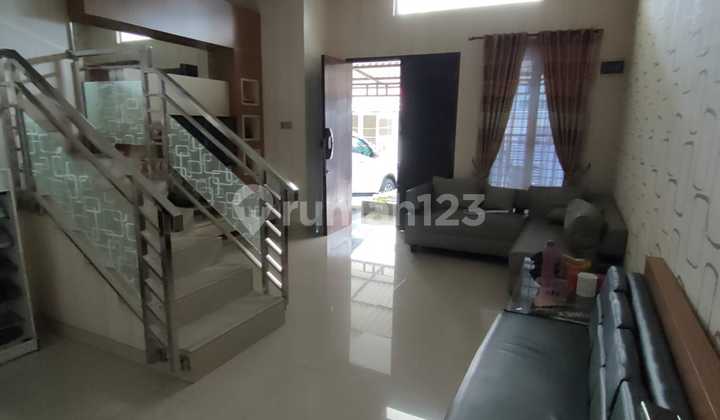 Quick Sale Minimalist House Elevated from the Road in Imperial Gading