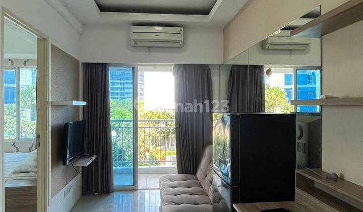 Disewakan Apartemen Tanglin Pakuwon 2BR Furnish Lantai Rendah View Pool 1