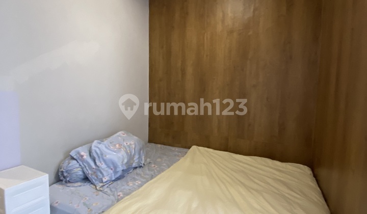 Apartemen the mansion 1 br furnish lantai sedang