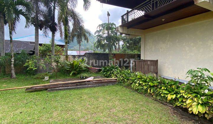 Rumah Dengan Konsep Villa Dengan view Gunung Lokon 4