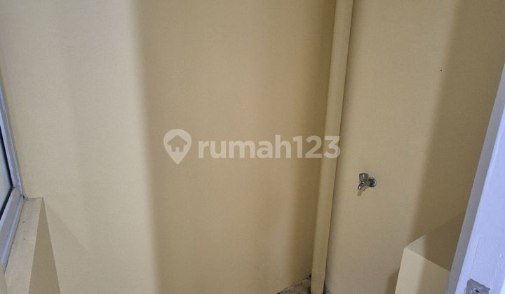 Mezzanine Type House Equipped with AC in Amarillo Village Gading Serpong 2