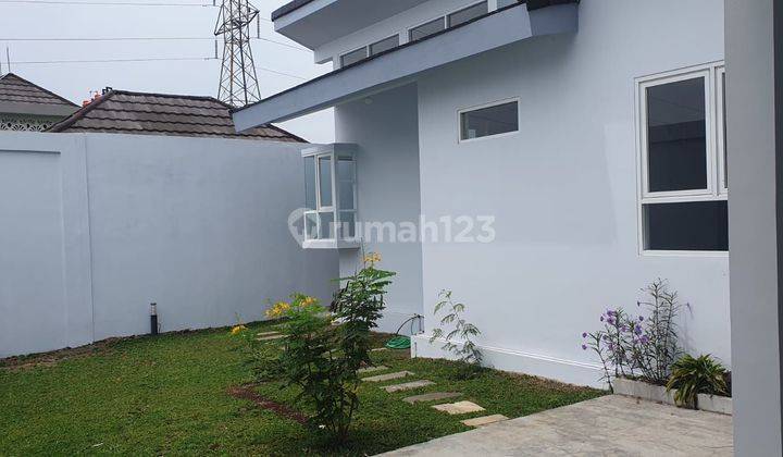 Rumah  modern 2 lantai Budi Indah 1