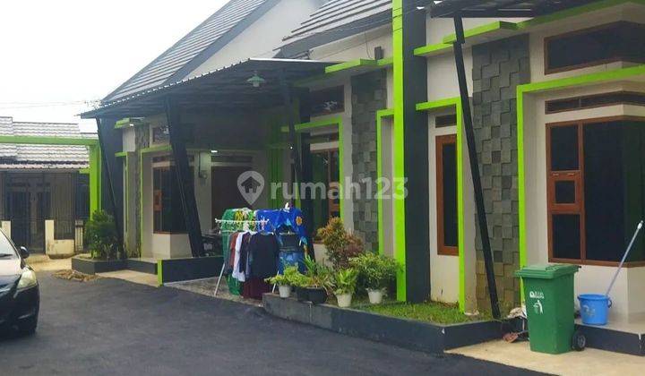 Rumah Cluster one gate system dekat stasiun commuter line 2